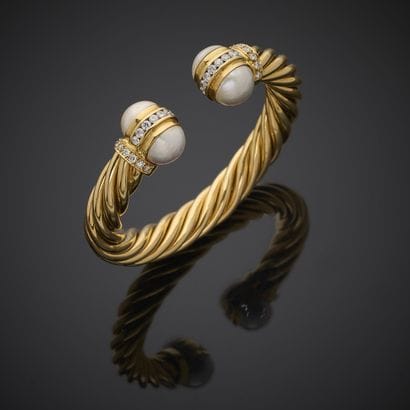 Bracelet jonc torsadé en or jaune 750 millièmes,...