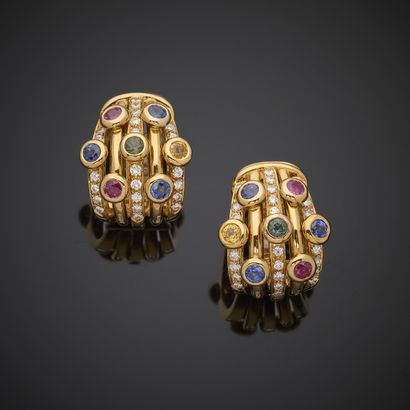 ADLER.
Paire de boutons d'oreille en or jaune...