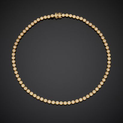 Collier rivière en or jaune 750 millièmes,...