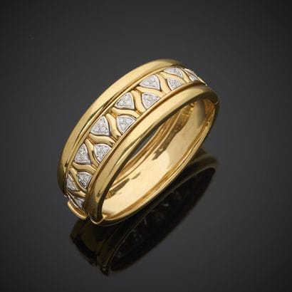 Cuff bracelet in yellow and white gold 750...