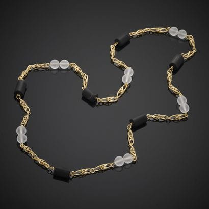Collier sautoir en or jaune 750 millièmes,...