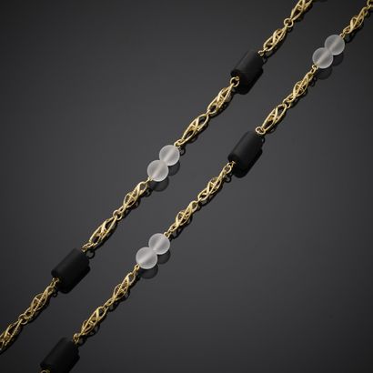 Collier sautoir en or jaune 750 millièmes,...