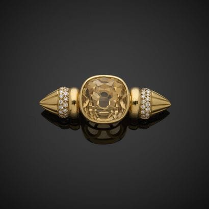 Broche en or jaune et gris 750 millièmes,...