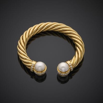 Bracelet jonc torsadé en or jaune 750 millièmes,...