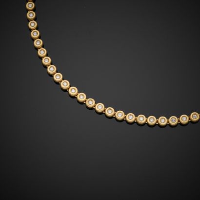 Collier rivière en or jaune 750 millièmes,...