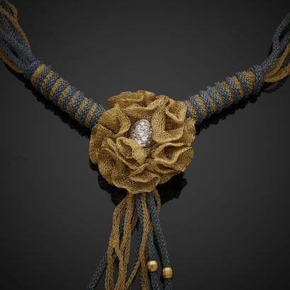 SIDRA.
Necklace in yellow and white gold...