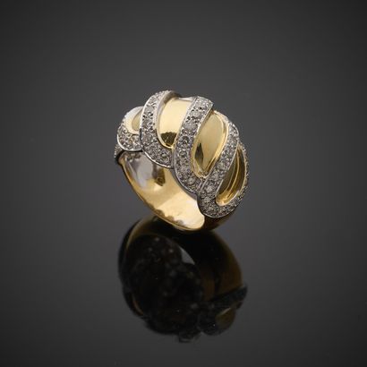 Bague bombée en or jaune et gris 750 millièmes,...