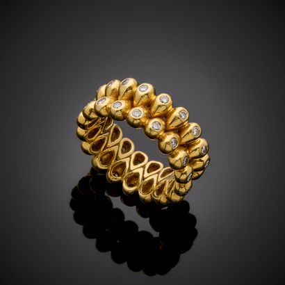 Bague en or jaune 750 millièmes, dessinée...