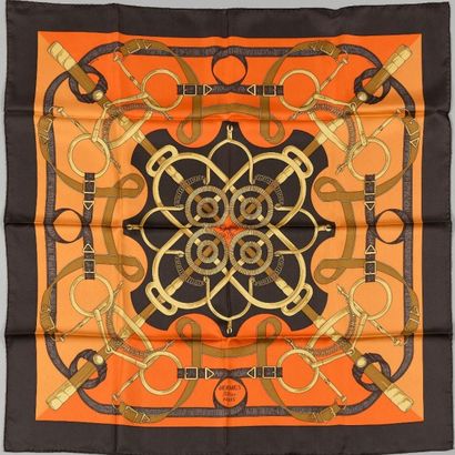 HERMES Paris

Carré de soie imprimée titré...