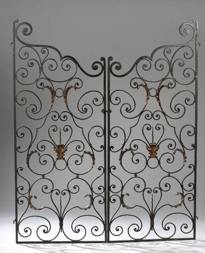 Deux portes en fer forgé et tôle redorée....