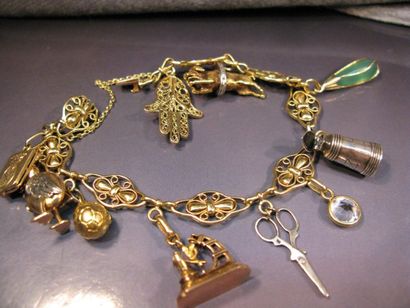 Bracelet en or jaune maille filigranée orné...