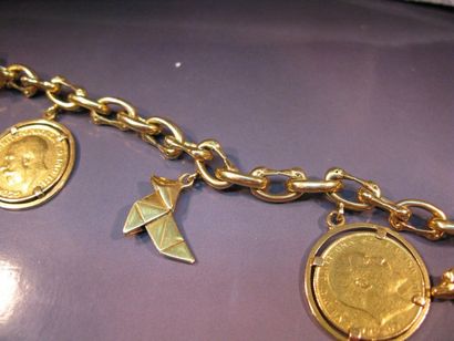 Bracelet en or jaune maille fantaisie orné...