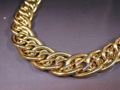 Collier en or jaune maille tressée en chute....