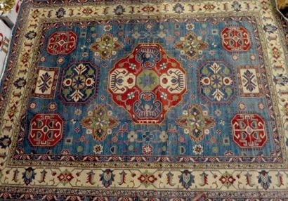 Grand tapis rectangulaire à motifs géométriques,...