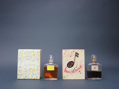 LEIGH PARFUMERS 
Deux flacons avec leur coffret...