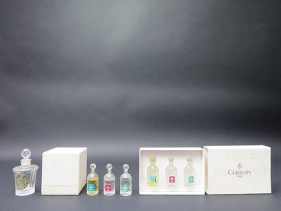 GUERLAIN
Lot comprenant deux coffrets parchemin...