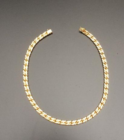 Collier en or jaune 18K à maillon gourmette...