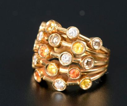 Bague en or jaune 18K à cinq brins sertis...