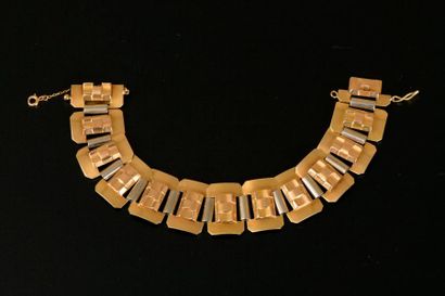 Bracelet en or jaune 18K à onze plaques rectangulaires...