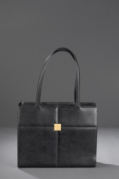 Yves SAINT LAURENT.

Sac à main/porte-documents...