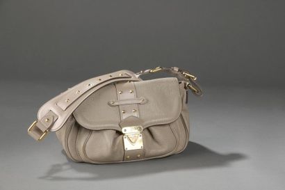 Louis VUITTON.

Sac à main porté épaule en...