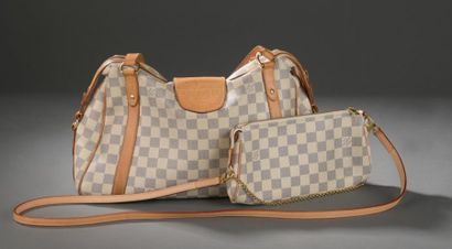 Louis VUITTON.

Sac à main porté épaule en...