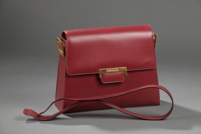 Yves SAINT LAURENT.

Sac à main trapézoïdal...