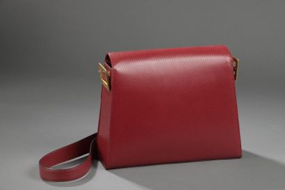 Yves SAINT LAURENT.

Sac à main trapézoïdal...