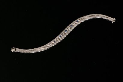 Bracelet souple en or gris 18K, griffé en...