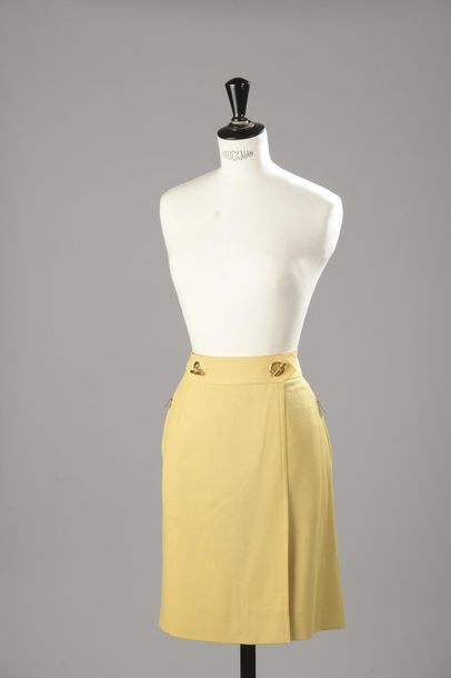 HERMÈS
Jupe portefeuille en laine jaune,...