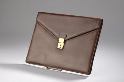 BALLY
Serviette en cuir cognac, le fermoir...