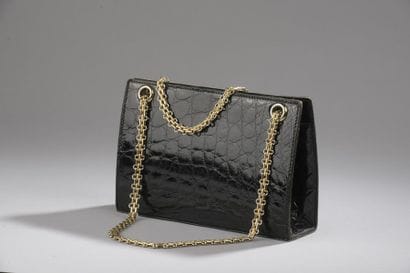 MENESTRIER
Sac à main en cuir vernis embossé...