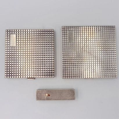 LOT in silver (min. 800) guilloché with square...