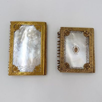 Two BAL BOOKS in chiselled amati gold metal...