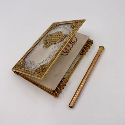 Two BAL BOOKS in chiselled amati gold metal...