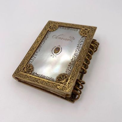 Two BAL BOOKS in chiselled amati gold metal...