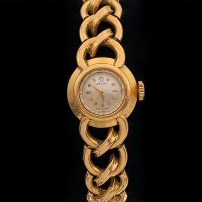 OMEGA
BRACELET Ladies' round watch in yellow...