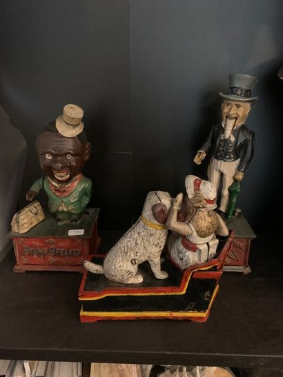 Trois tirelires américaines en fonte