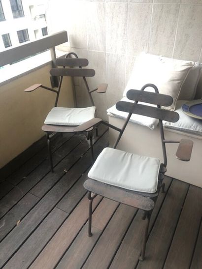 Paire de fauteuils de jardin en fer forgé....