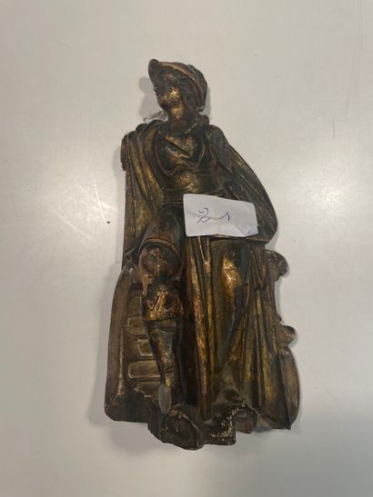 Statuette en bois à patine doré.

H : 17,5...