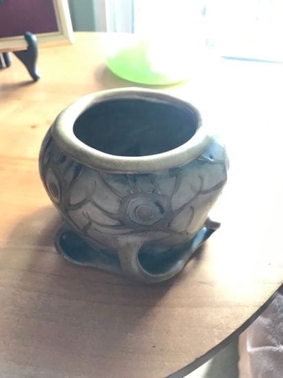 Amphora

Small stoneware vase with iridescent...