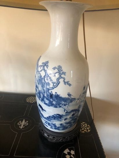 Large blue and white porcelain vase.

Asia

Mounted...