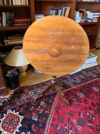 Lot: a tripod pedestal table with tilting...
