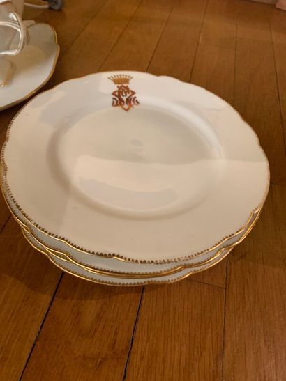 Part of service in white porcelain, gold...