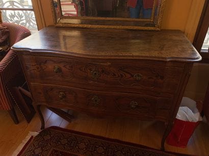 A walnut chest of drawers.

Old regional...