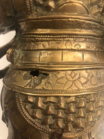 Personnage asiatique en bronze doré

H. 25...