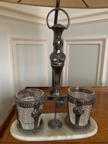 Silver oil and vinegar lamp with sphinxes...