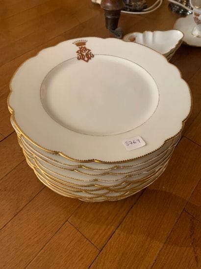 Part of service in white porcelain, gold...