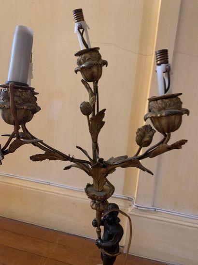 Pair of candelabras in chased and gilded...