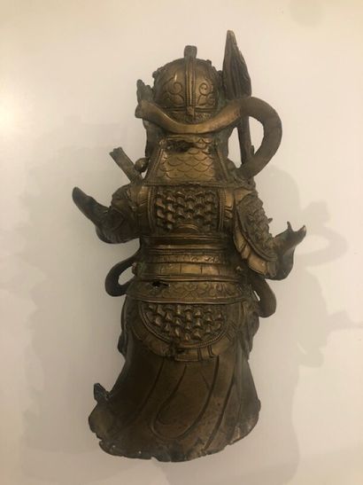 Personnage asiatique en bronze doré

H. 25...